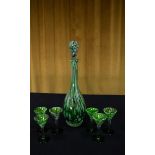 A seven-piece marbled green and opaque white glass liqueur set with gold 'aventurine' flake