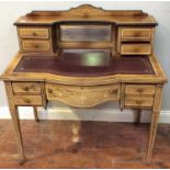 An Edwardian rosewood writing desk, the raised back with recessed mirror flanked by two short