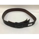 A German Luftwaffe third reich brown leather belt with embossed buckle depicting an eagle