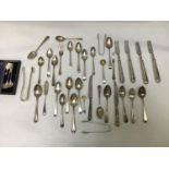 A good collection of assorted silver teaspoons, predominantly Georgian, including examples by Thomas