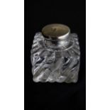 A silver-topped glass ink bottle by Finnigans Ltd of Manchester, hallmarked London, 1916, 8.5cm tall