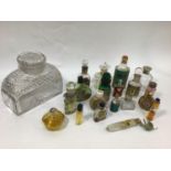 A quantity of miniature / sample perfume bottles, jar of smelling salts, powder nail polish, small