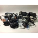 A quantity of camera equipment including an Olympus CM-2, Vivitar Series 1 macro lens, Pentax and