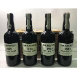 Four bottles of Cockburns 1983 vintage port, each with wax seals to tops (in varying condition) in