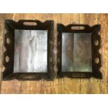 Two Georgian oak graduated rectangular cutlery trays with fret-cut handles pierced sides, the