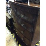 A mahogany bow-front chest of two short over three long, graduated drawers, each with later