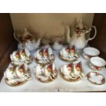 SECTIONS 1 & 2. A 49-piece Royal Albert 'Old Country Roses' pattern part tea and dinner service