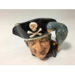 A Doulton & Co Limited character jug, Long John Silver No. 'D 6386', 10cm high