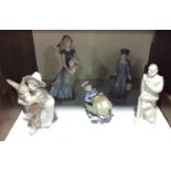SECTION 18. Three Lladro figures including 'Little Skipper No. 5936', a boy hugging a donkey no.