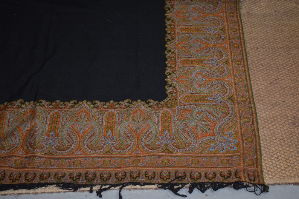French long wool carriage shawl, late 19th century, 133in. X 62in. 338cm. X 158cm. Plain black - Image 6 of 7