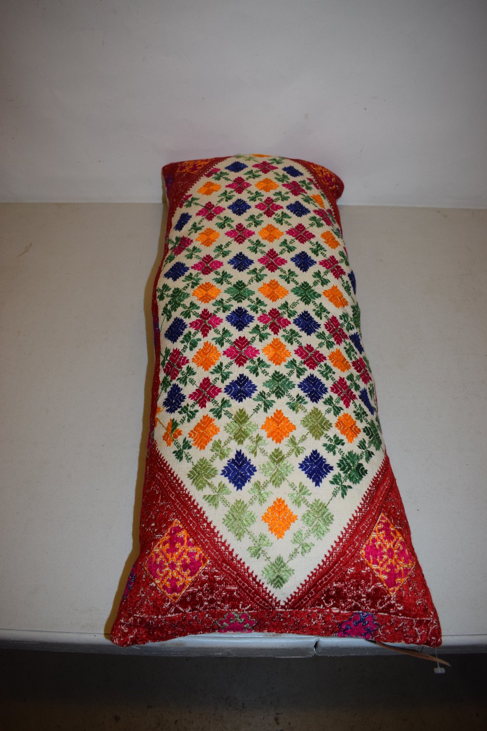 Swat Valley floss silk embroidered bolster, Pakistan, second half 20th century, 31in. X 13in. - Image 4 of 5