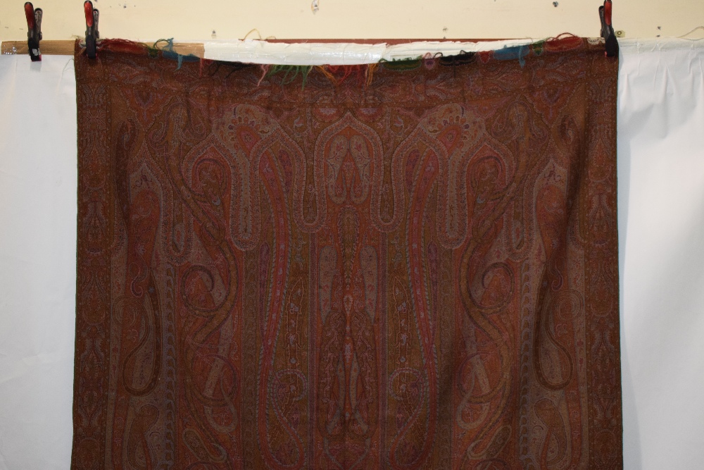 'Paisley' long wool carriage shawl with small cream centre medallion surrounded by complex elongated - Image 2 of 8