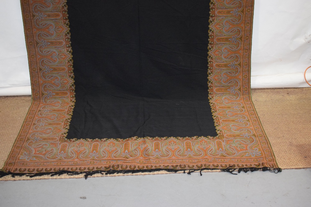 French long wool carriage shawl, late 19th century, 133in. X 62in. 338cm. X 158cm. Plain black - Image 5 of 7