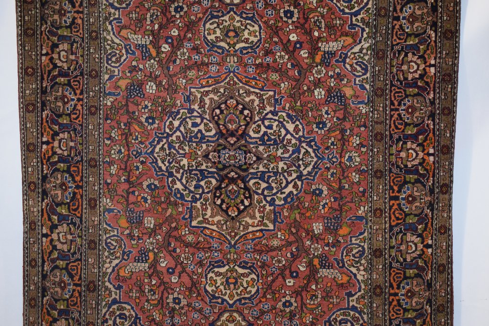 Esfahan rug, central Persia, circa 1930s-40s, 6ft. 11in. X 4ft. 10in. 2.11m. X 1.47m. Light red - Image 3 of 6