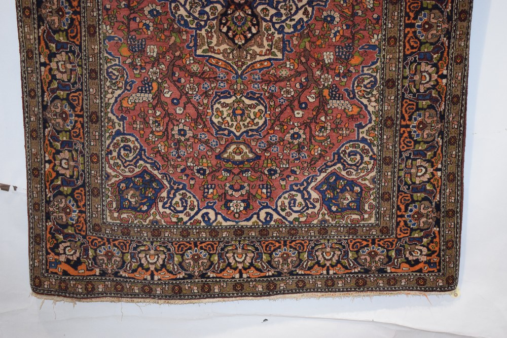 Esfahan rug, central Persia, circa 1930s-40s, 6ft. 11in. X 4ft. 10in. 2.11m. X 1.47m. Light red - Image 4 of 6