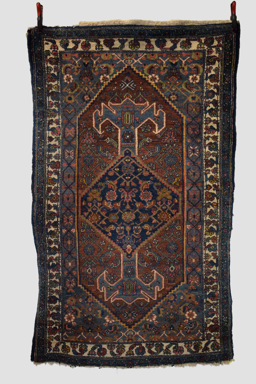 Hamadan rug, north west Persia, circa 1930s, 7ft. 1in. X 4ft. 3in. 2.16m. X 1.30m. Losses to ends.