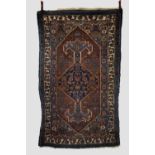 Hamadan rug, north west Persia, circa 1930s, 7ft. 1in. X 4ft. 3in. 2.16m. X 1.30m. Losses to ends.