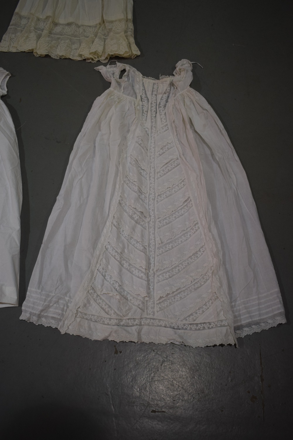 Two fine white cotton christening gowns, one with white embroidered panelled skirt; the other with - Image 3 of 8