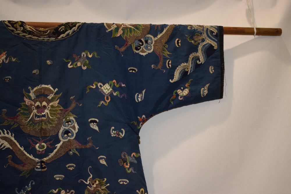 Fine Chinese blue silk dragon robe, late 19th/early 20th century, the four-clawed dragons above a - Image 15 of 17