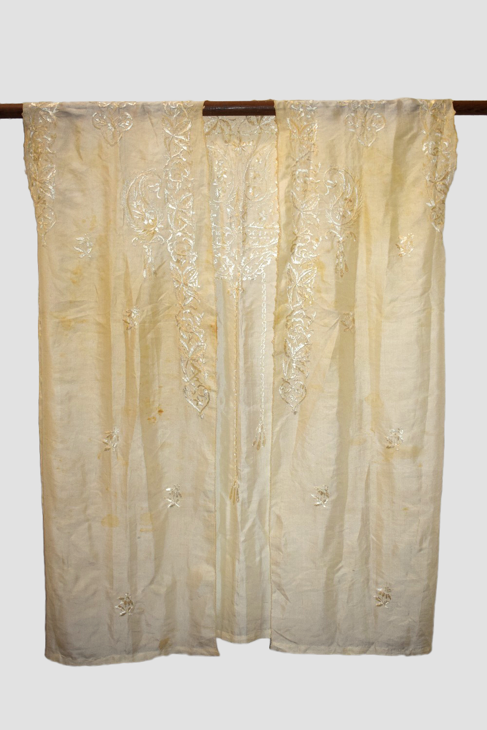 Middle Eastern cream silk Abba, first half 20th century, embroidered in cream floss silk, unlined.