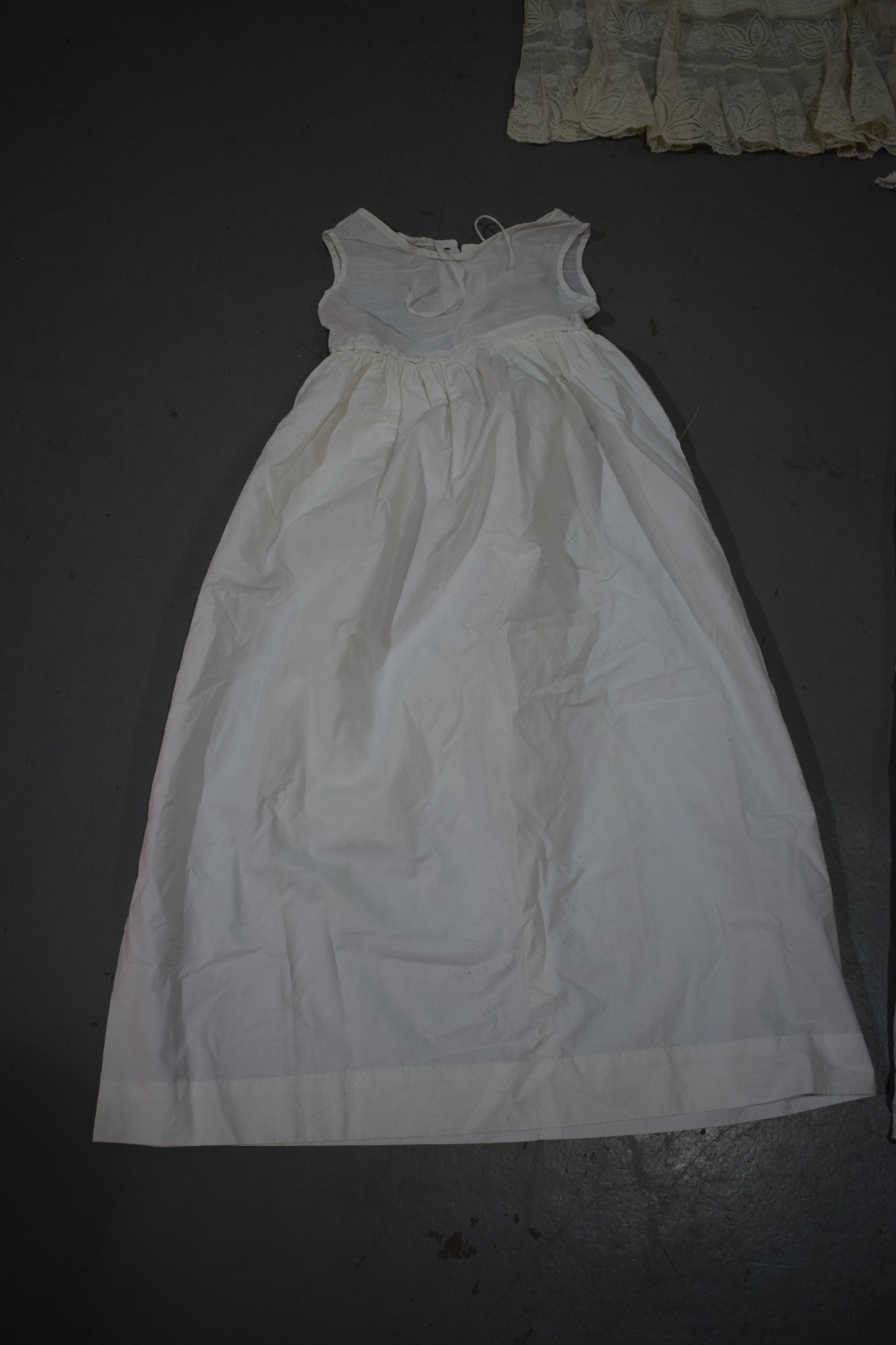 Two fine white cotton christening gowns, one with white embroidered panelled skirt; the other with - Image 4 of 8