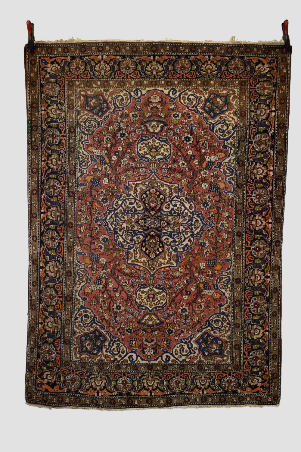 Esfahan rug, central Persia, circa 1930s-40s, 6ft. 11in. X 4ft. 10in. 2.11m. X 1.47m. Light red
