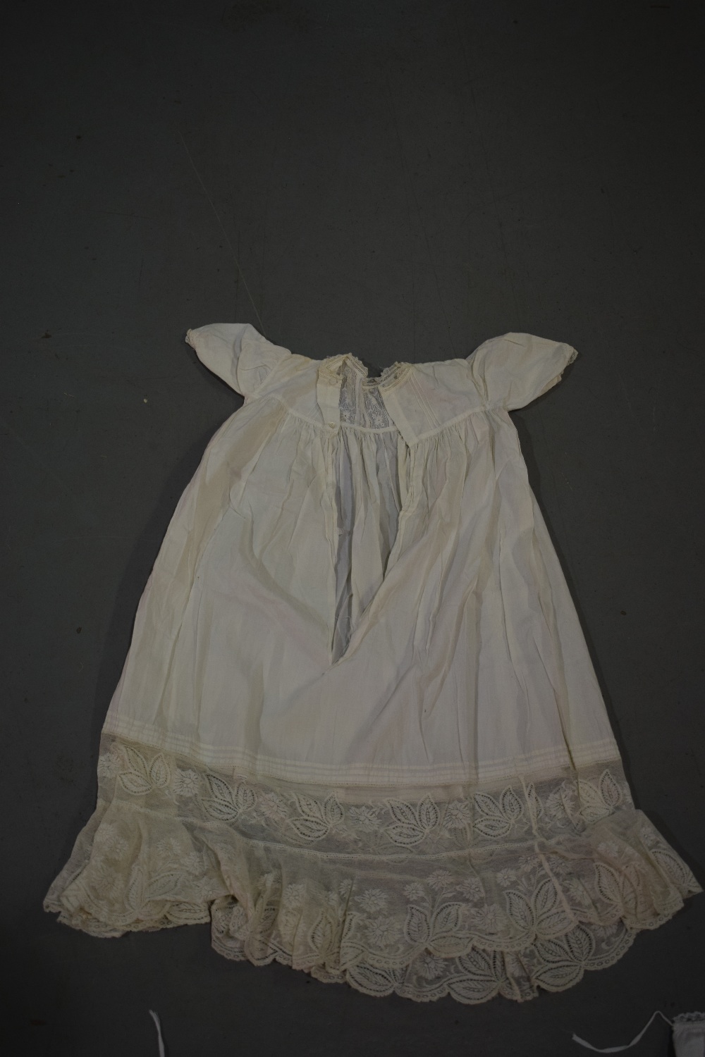Two fine white cotton christening gowns, one with white embroidered panelled skirt; the other with - Image 8 of 8
