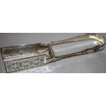 A pair of George IV silver pair of asparagus tongs, Kings hourglass pattern crested, with pierced