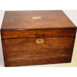 A Victorian walnut veneered work and writing box, the hinged lid and fall front reveals a fitted