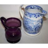 An early Victorian blue and white transfer pint jug, decorated the Royal Arms, a landscape with a