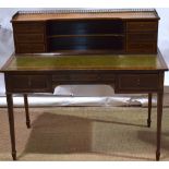 A Sheraton Revival style mahogany Bonheur du Jour, inlaid stringing, the writing top inset gilt