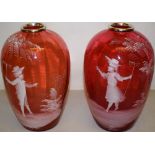 A pair of late Victorian panelled ruby glass vases, with white enamel Mary Gregory figures of a