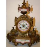 A French nineteenth century ormolu case mantel clock, in Louis XVI style, having pink and floral
