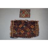 Two Persian weavings: the first a Jaf Kurd bag face, north west Persia, 2ft. 1in. x 3ft. 0.64m. x