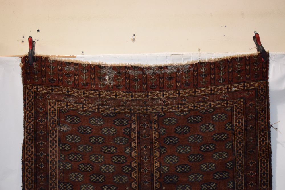 Two rugs: the first: Yomut Turkmen ensi, Turkmenistan, circa 1920s, 5ft. 7in. x 4ft. 7in. 1.70m. x - Image 2 of 16