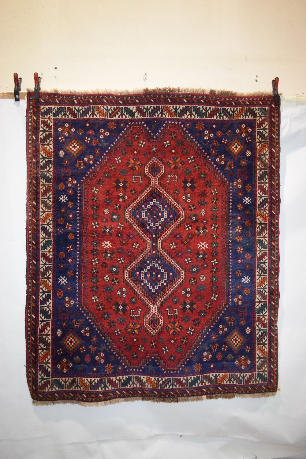 Niriz rug, Shiraz area, south west Persia, circa 1950s, 6ft. 3in. x 5ft. 3in. 1.91m. x 1.60m. Red