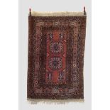 Afghan rug, second half 20th century, 6ft. 5in. x 4ft. 1in. 1.96m. x 1.25m. Light pinky-brown