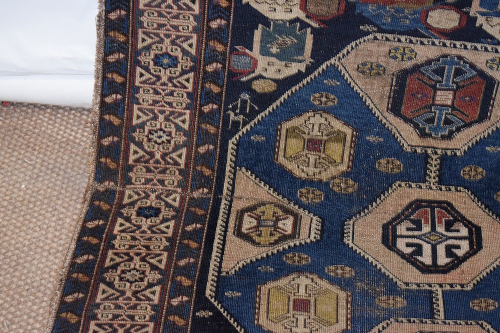 Caucasian runner with Kufic main border, Daghestan district, late 19th century, 16ft. 2in. x 3ft. - Image 10 of 11