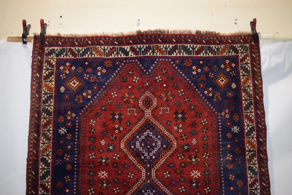 Niriz rug, Shiraz area, south west Persia, circa 1950s, 6ft. 3in. x 5ft. 3in. 1.91m. x 1.60m. Red - Image 2 of 6