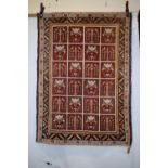 Two Persian rugs, the first: Fars, south west Persia, circa 1940s, 4ft. x 2ft. 10in. 1.22m. x 0.86m.