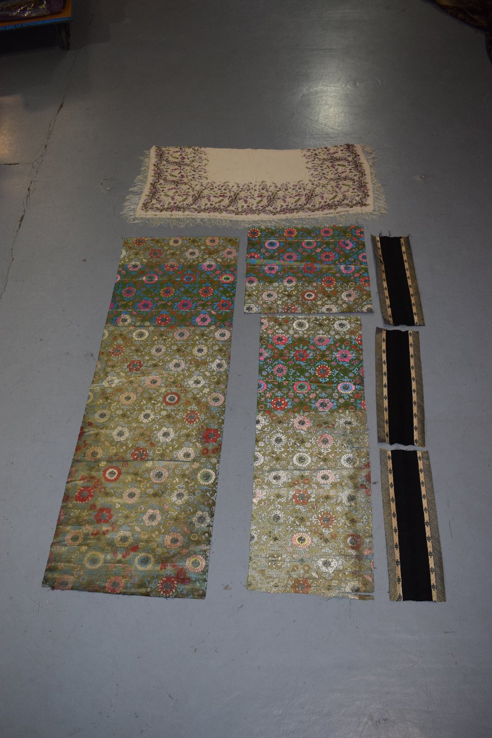 Three Chinese brocaded silk and metal thread length fragments, 74in. x 23 1/2in. 188cm. x 60cm.;