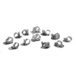 Twelve Silverplate Figural Dog Napkin Rings