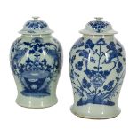 Associated Pair of Blue and White Porcelain Urns