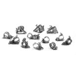 Twelve Silverplate Figural Cat Napkin Rings