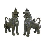Pair of Patinated Bronze Foo Dogs