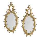 Pair of Italian Rococo-Style Oval Mirrors