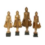 Group of Four Carved and Giltwood Asian Figures