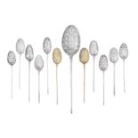 Twelve English Silver Mote Spoons