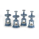 Four Chinese Blue and White Pricket Candlesticks