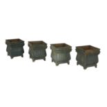 Four Cast Iron Planters in the Neoclassical Taste